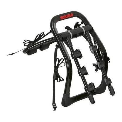 A black Yakima FullBack bike car rack with straps and mounting points, photographed from a side angle against a white background.