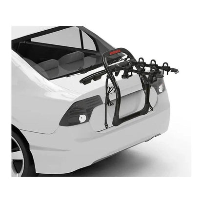 Back view of the Yakima FullBack 2 car rack mounted on a white sedan with a clean white background.