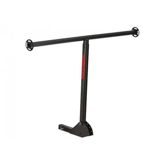 A black Yakima LongArm car rack system with a T-shaped bar and a red logo on the vertical pole, photographed from a front angle against a white background.