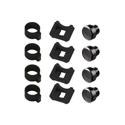 Four black Yakima RoundBar SL adapters with square cutouts and matching caps arranged on a white background.