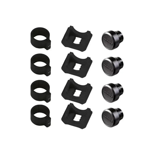 Four black Yakima RoundBar SL adapters with square cutouts and matching caps arranged on a white background.