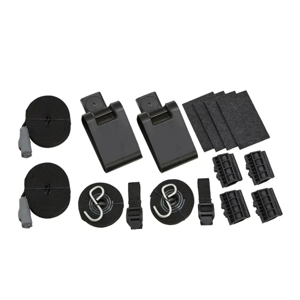 A complete Yakima Showdown car rack water accessory kit with black components, foam pads, and straps displayed on a white background.